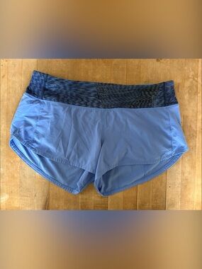 lululemon athletica blue running shorts with navy patterned waist